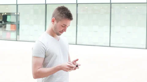 Student playing with electronic device, playing games Stock Footage 39343162