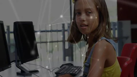 Student practicing coding initiating digital network overlay then pausing and Stock Footage 312297912