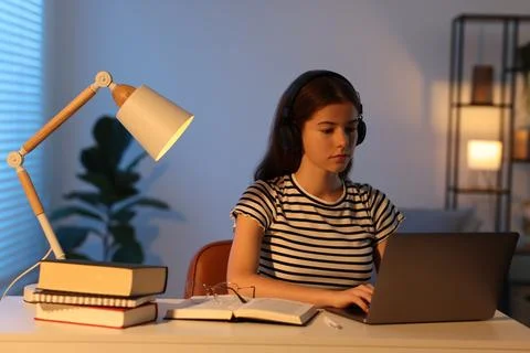 Student preparing for exam with laptop at table indoors Stock Photos