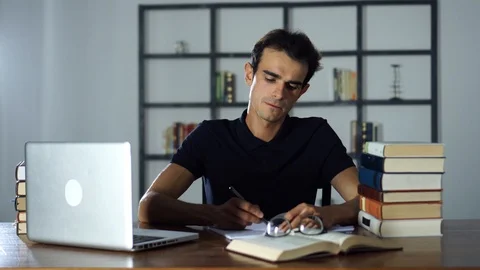 Student preparing Exam or Test in the University Library, Studying Stock Footage 93269715