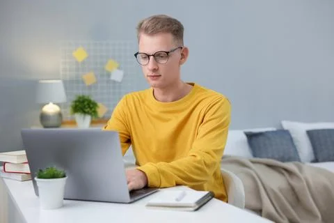 Student preparing for exam at table indoors Stock Photos