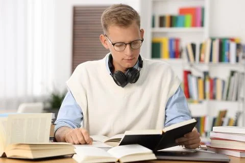 Student preparing for exam at table indoors Stock Photos
