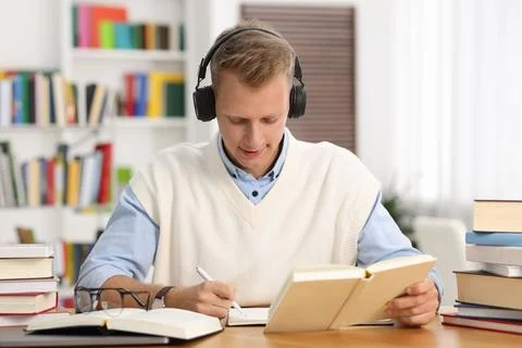 Student preparing for exam at table indoors Stock Photos