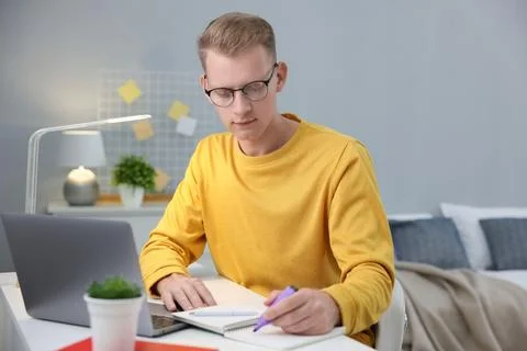 Student preparing for exam at table indoors Stock Photos