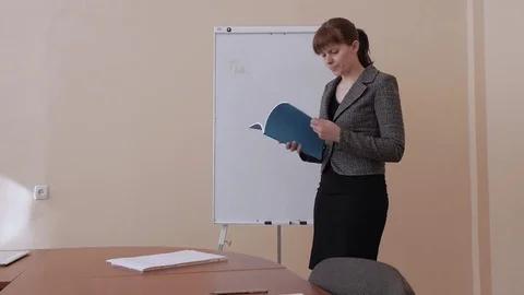 Student  preparing for the presentation of their project for the audience. Stock Footage 73600446