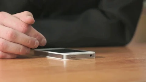 Student pressing finger on screen of smartphone Stock Footage 82806482