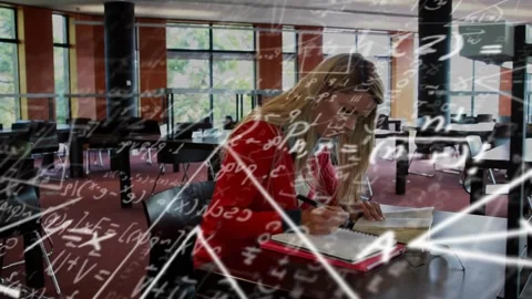 Student pressing pen on notebook and initiating math formulas floating while Stock Footage 320127680