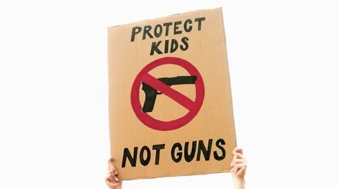 Student protest supporting gun control on the road- People march for kids lives  Stock Footage 239455357