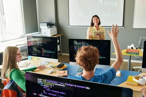 Student Raising Hand in Class 写真素材