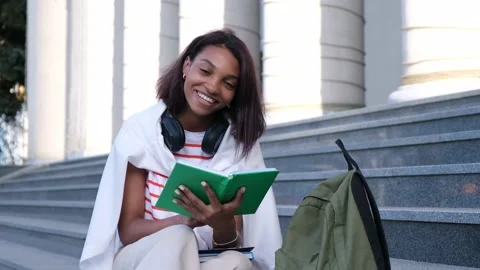 Student read book at stairs of Harvard University's building. Stock Footage 212657261