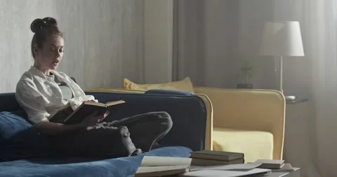 Student reading book and preparing for session Video stock 172146763