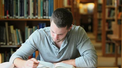 Student reading a book Stock Footage