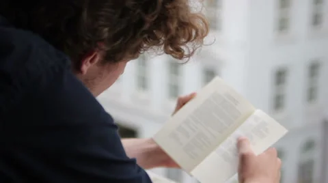 Student reading book Stock Footage 41630886