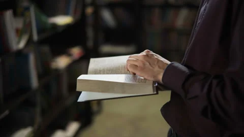 Student reading a book in the library. education concept Video stock 86213266