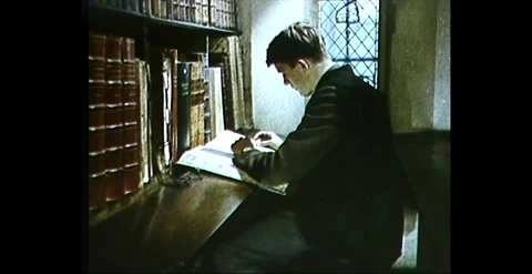 Student Reading Chained Book at Merton College Library, Oxford University (1959) Stock Footage 258819544