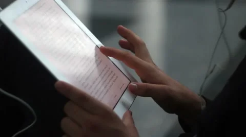 Student is reading in tablet PC Stock Footage 54267394