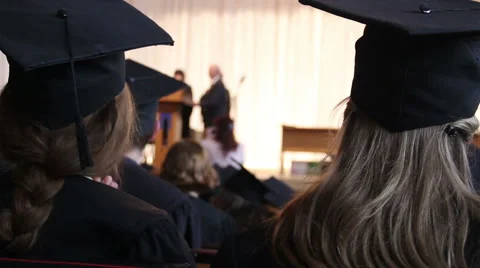 Student receiving higher education certificate from dean, graduation ceremony Stock Footage