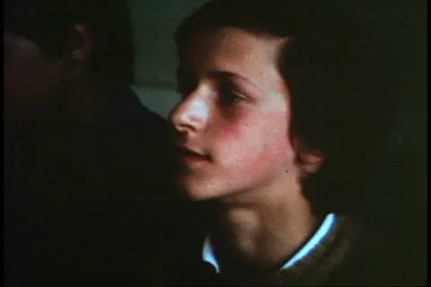 Student in religion class in Venice, Italy, close up face, boy, talks Stock Footage
