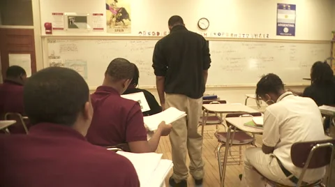 Student reluctantly walking up to whiteboard Video stock 1077461