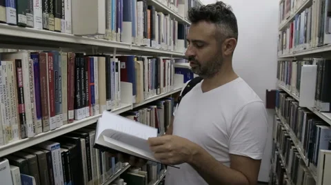 Student in Research Library at the College Stock Footage 54942860