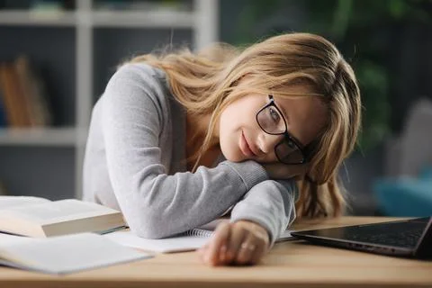 Student resting on table Stock Photos