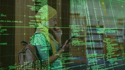 Student scrolling smartphone by library shelves, revealing green code overlay Stock Footage 312280848
