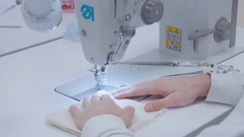 Student on a sewing machine - Close up - Slowmotion 25 Stock Footage 162474197
