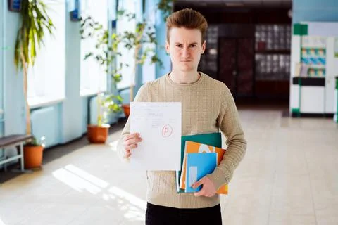 Student shows low academic performance and receives bad marks Stock Photos