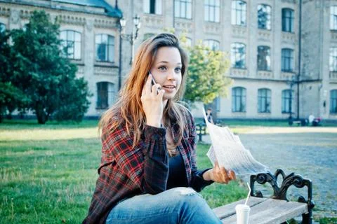 The student is sitting on the bench Stock Photos