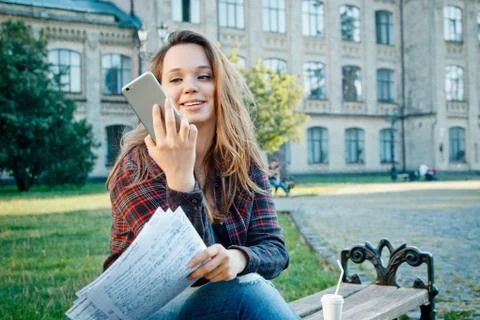 The student is sitting on the bench Stock Photos