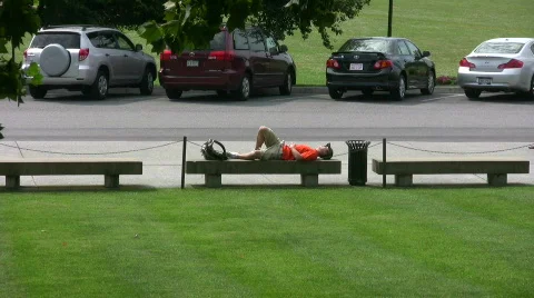 Student sleeping on bench Video stock 482027