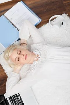 Student sleeping between documents Stock Photos