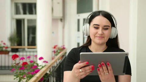Student smiling, chatting with each other, using gadget, tablet for work office 動画素材 138296648