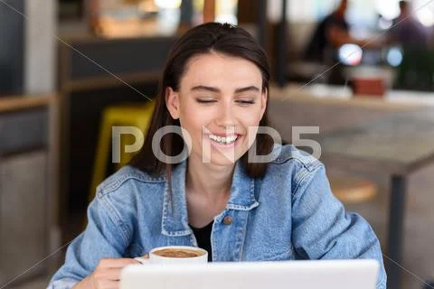 Student smiling at her workplace Stock Photos
