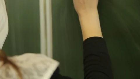 The student solves equations  on the blackboard Stock Footage 72197442