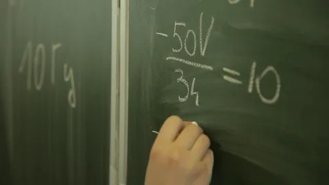 The student solves equations  on the blackboard 動画素材 72197470