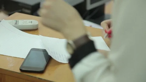 The student solves equations  in the notebook Stock Footage 72196992