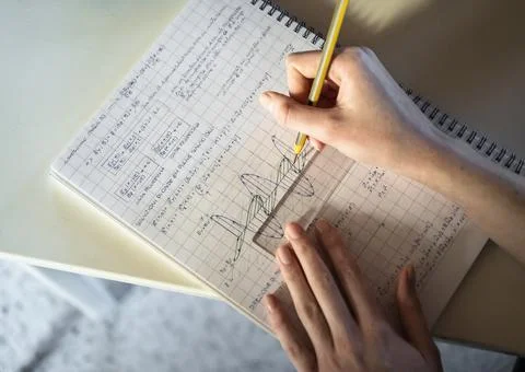 Student solving math problem Stock Photos