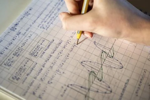Student solving math problem student solving math problem Copyright: xZoon... Stock Photos