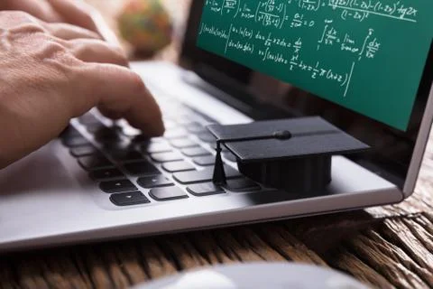 Student Solving Mathematical Problems On Laptop Foto stock