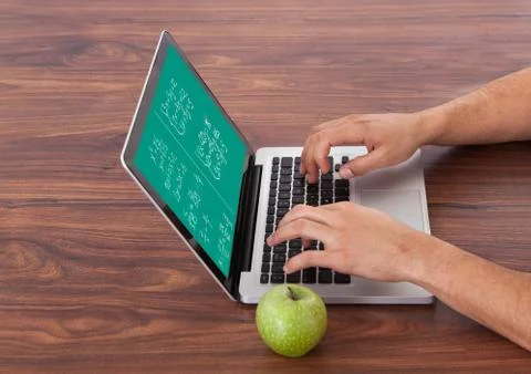 Student solving math's problem on laptop 스톡 사진