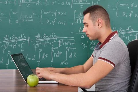 Student solving math's problem on laptop Stock Photos