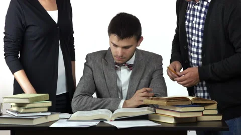 Student solving the problem his teacher is praising him. Stock Footage 63854816