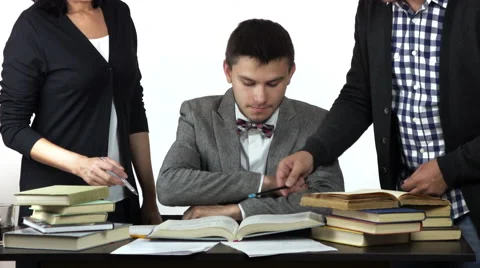 Student solving the problem his teachers are praising him. Stock Footage 63854865