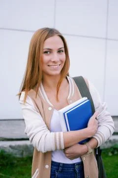 Student standing and smiling Stock Photos