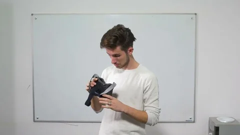 Student standing in front of whiteboard experiencing for the first time vir.. Stock Footage 71471435