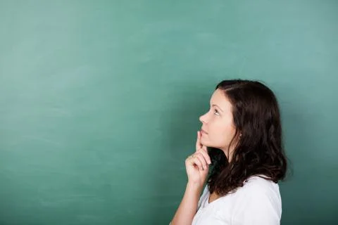 Student standing solving a problem Stock Photos
