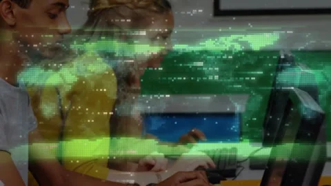 Student starting typing at lab, peers joining and working while green glitch Stock Footage 330540871