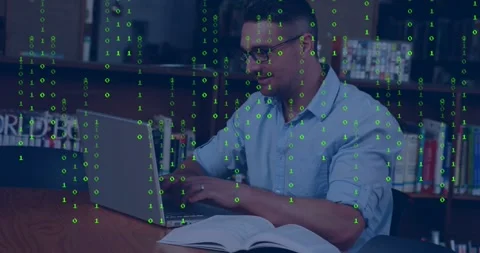 Student starting typing on laptop using library book, binary overlay pulsing Video stock 328684717