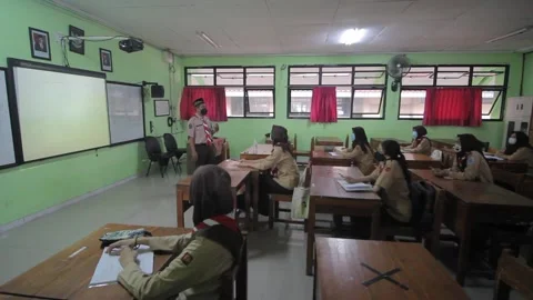STUDENT STUDY IN CLASS IN NEW NORMAL ERA, IN PANDEMIC SITUATION. NEWS Stock Footage 151823449